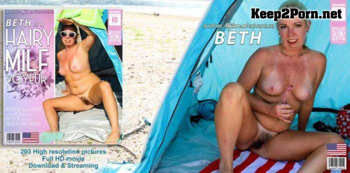 Beth (45) - See voyeur MILF Beth show off her hairy pussy at the beach (14666) (MP4 / FullHD) Mature.nl